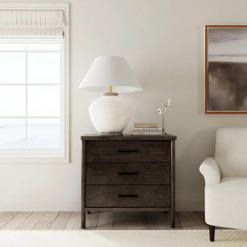 Commode en bois à 3 tiroirs et pieds arrondis